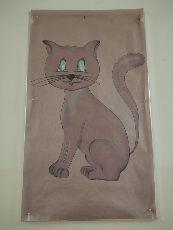 Rysunek dużego brązowego kota -ozdoby z okazji Dnia Kota